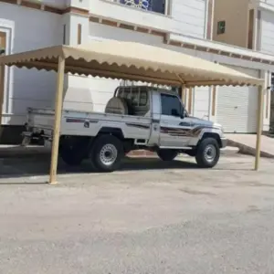 0077 انجاز الظل للمظلات والسواتر | مظلات